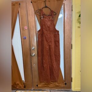 NWT overalls, rust color. Size large. Corduroy